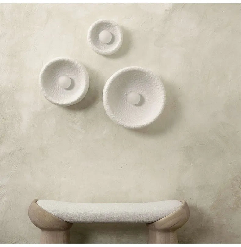 Japanese-style minimalist wall lamp with resin shade in three diameter sizes for modern interiors