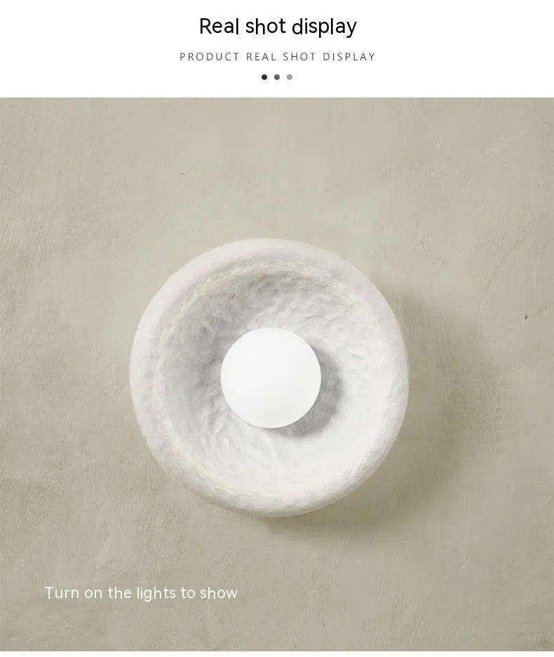 Japanese-style minimalist wall lamp with resin shade in three diameter sizes for modern interiors