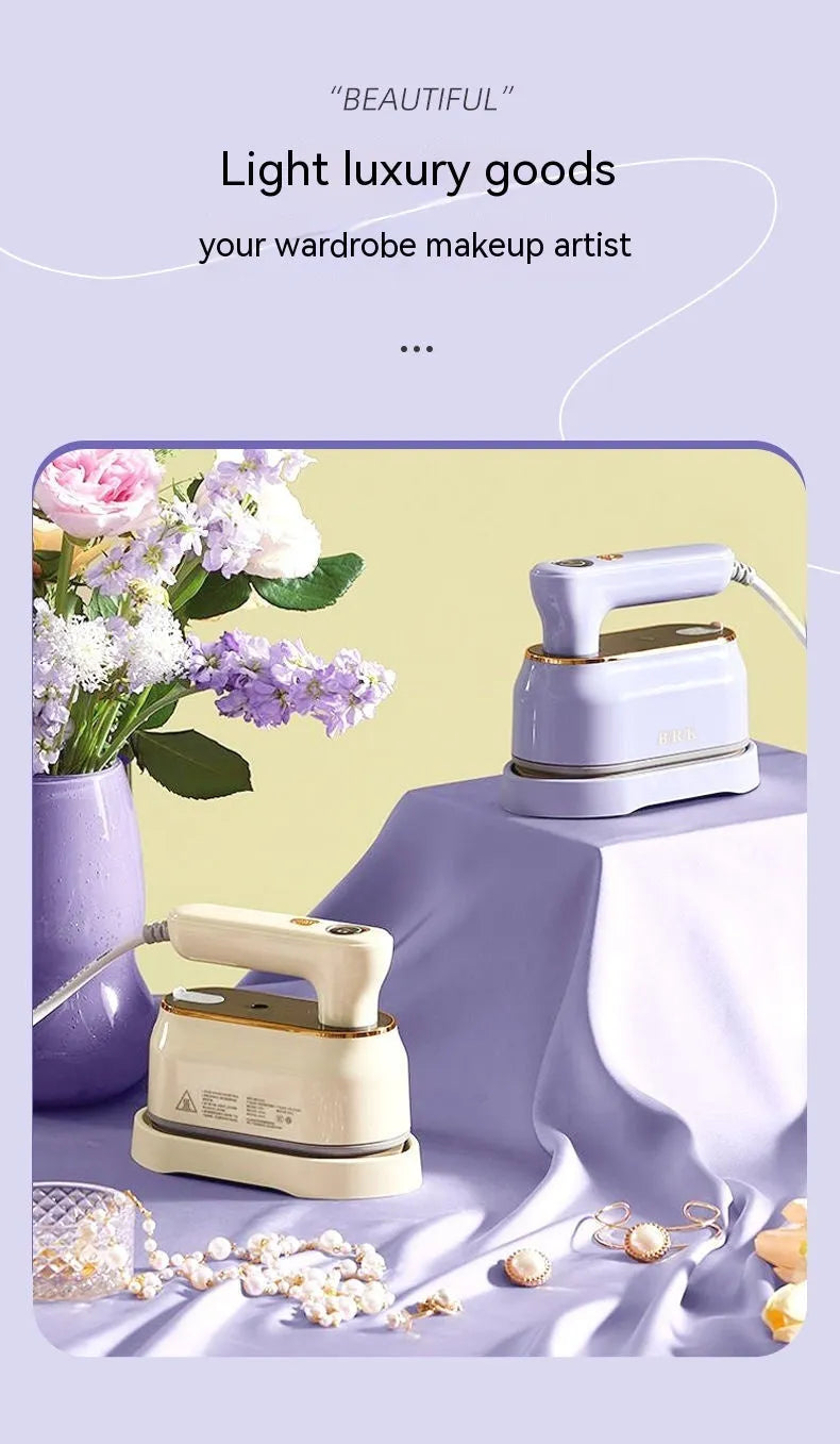Milky white foldable portable steam iron with ceramic soleplate and international plug adaptors.