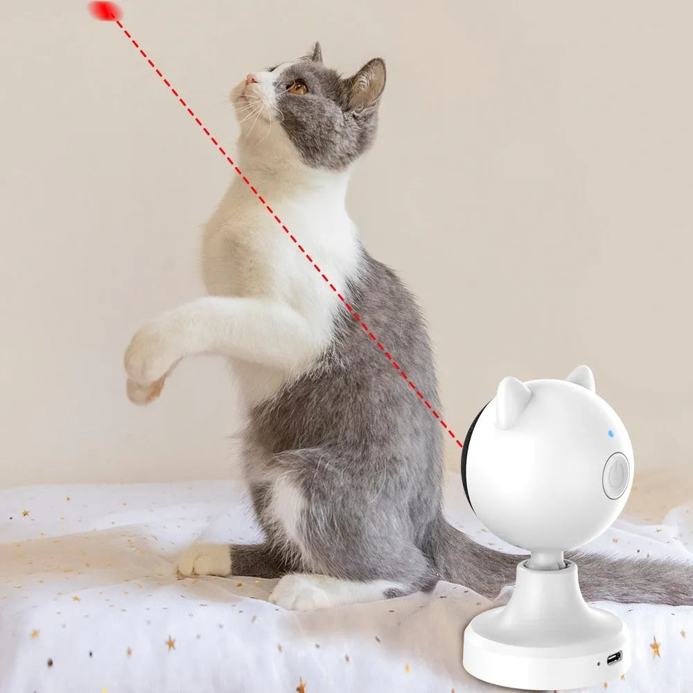 White smart laser cat teaser toy with USB charging on a floor, made of ABS plastic