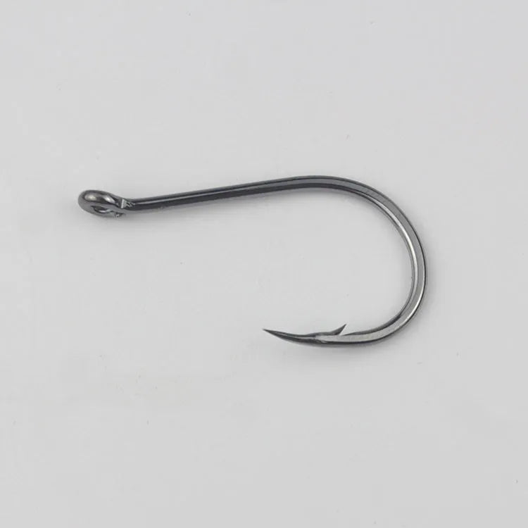Barbed sea fishing hooks with ring eye and crooked point in a bulk pack for rock and saltwater fishing.