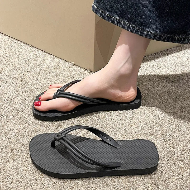 Men's casual PVC flip flops in beige with toe-covering style and injection moulded sole.
