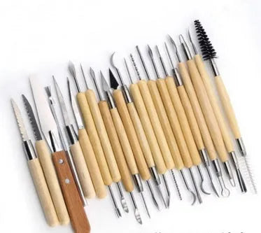 27-piece pottery clay tool set with wooden, stainless steel, and plastic tools in OPP storage bag