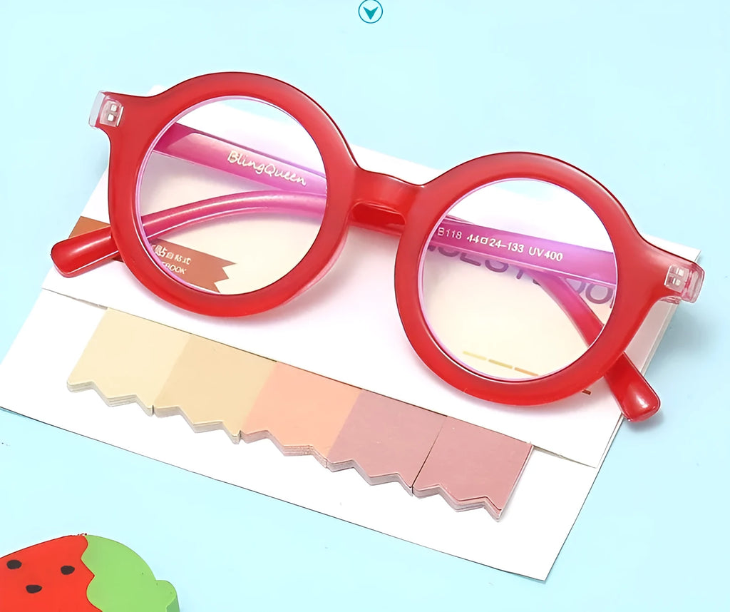 Retro round glasses with plastic frames in leopard print colour and clear lenses.