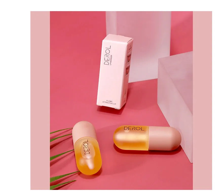 Clear lip plumper oil 5.5ml in light yellow formula with applicator wand for chapped dry lip care