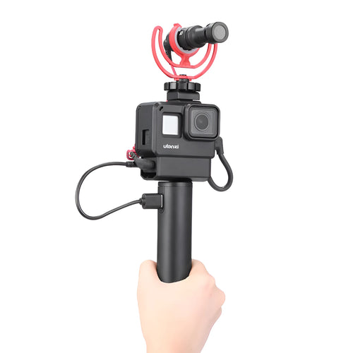 Black aluminium alloy portable power bank with a carry handle and strap, showing compact size