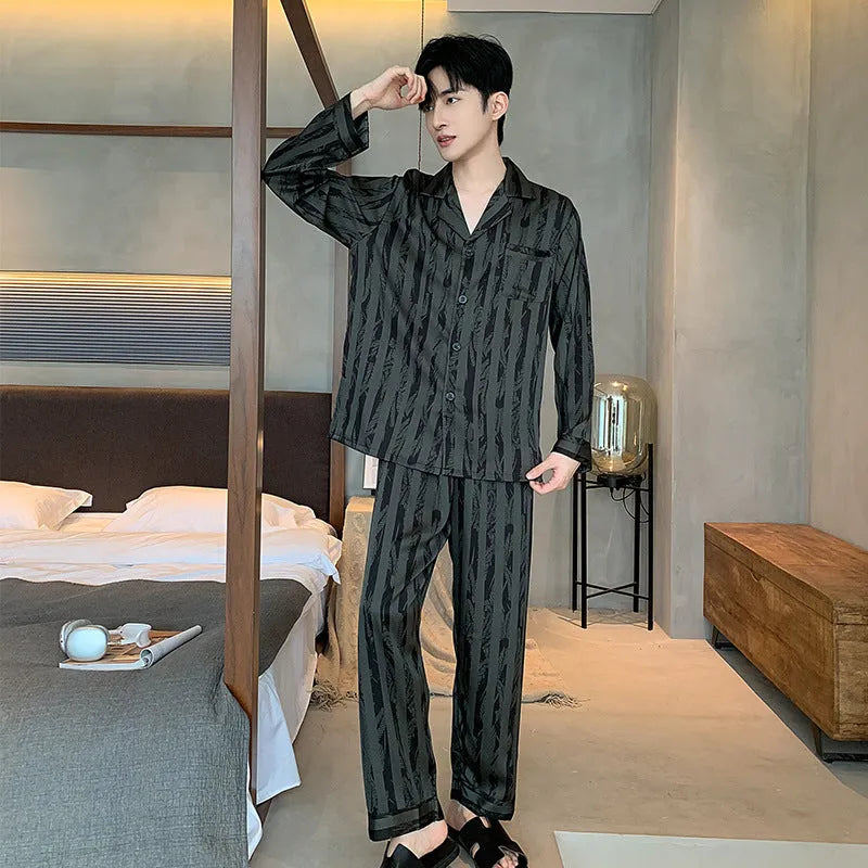Men's black striped ice silk pajama set with V-neck top and elastic trousers