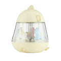 USB carousel music light with rotating trojan, music box, and warm yellow light on a desk.