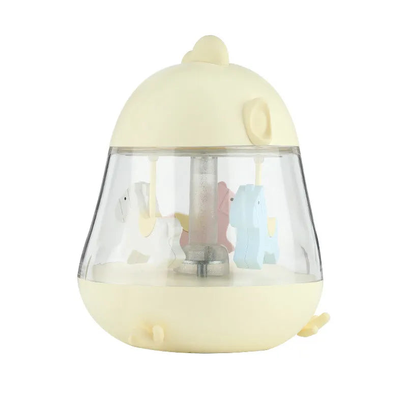 USB carousel music light with rotating trojan, music box, and warm yellow light on a desk.