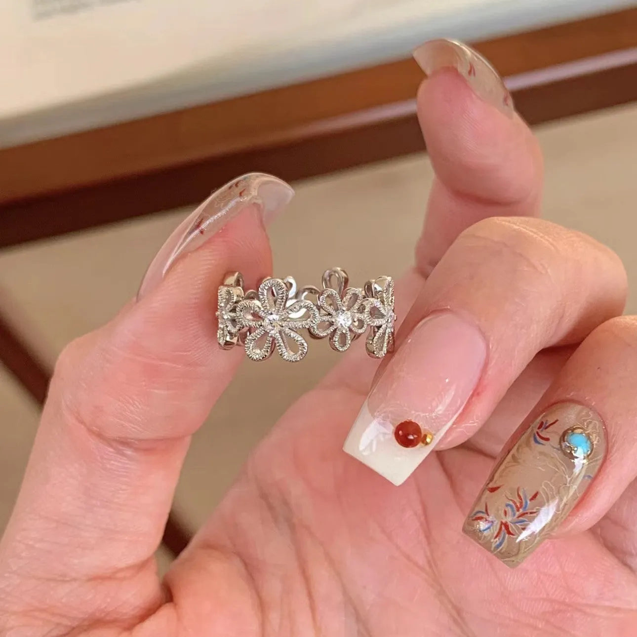Copper lace hollow five petal flower ring for women with electroplated finish