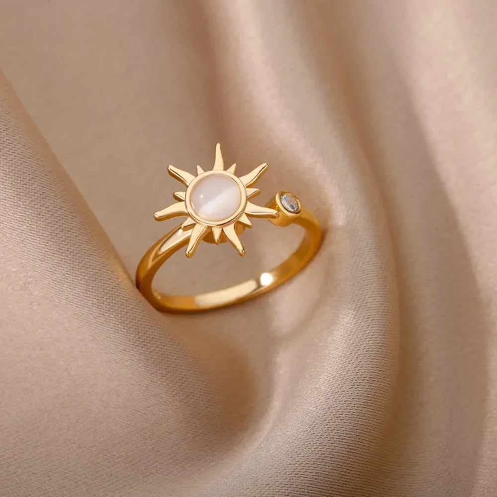 Gold and platinum coloured adjustable copper decompression ring with geometric rotatable design