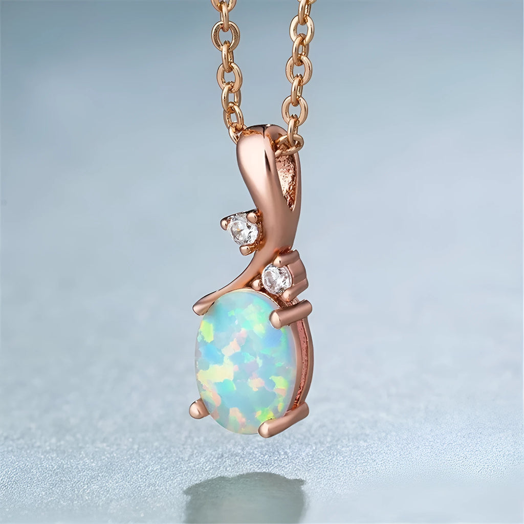 Water drop shaped opal pendant necklace on adjustable O-chain in rose gold or white finish