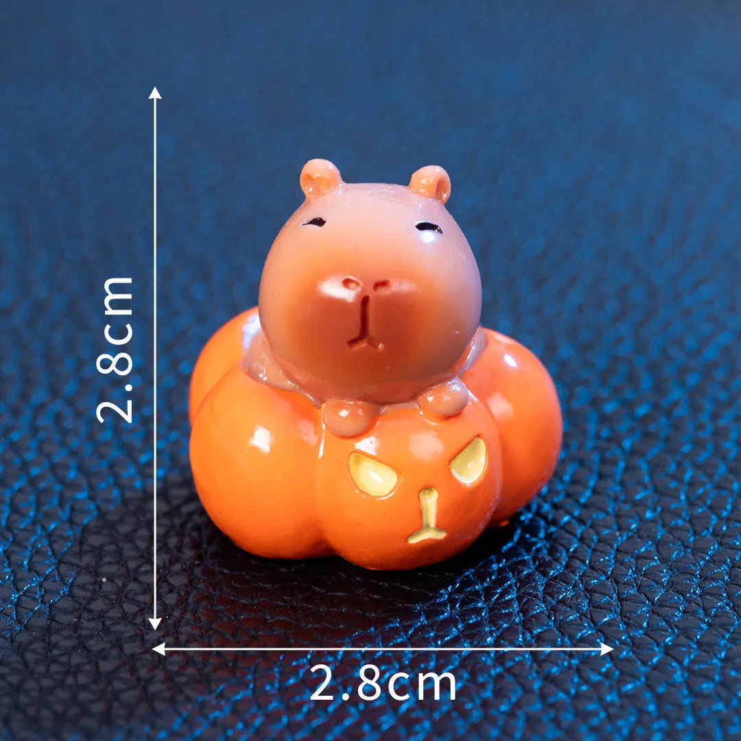 Halloween capybara resin figurine in one of eight designs like pumpkin or vampire.
