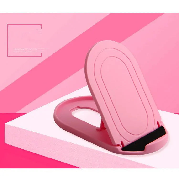 Plastic mobile phone stand with lazy bracket design in assorted colours on a desk.