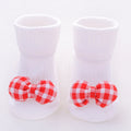 Cotton baby floor socks in multiple designs including animal prints and bows for infants 0-3 months