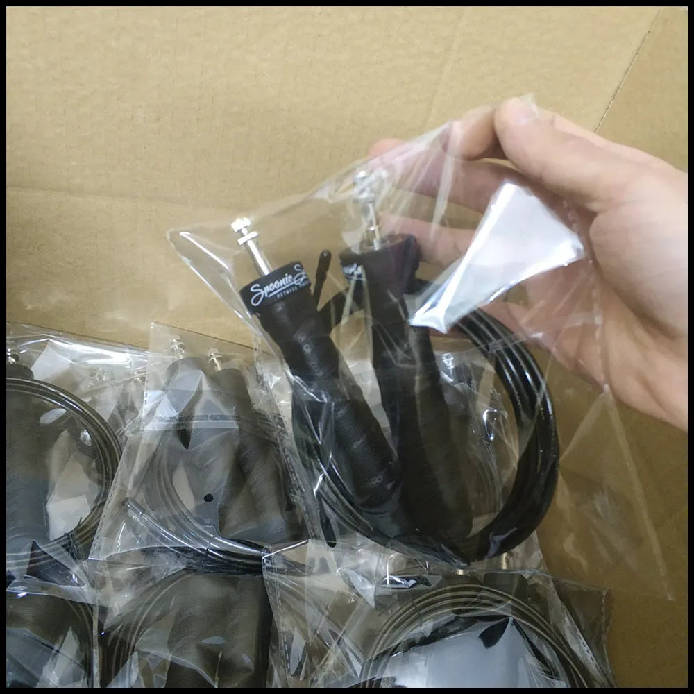 Jump rope with black PP handle, PU sweat belt, PVC wire rope on blue background