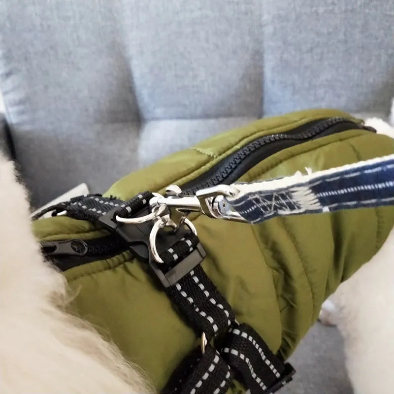 Waterproof dog coat with integrated harness in red, navy blue, and army green colours for winter.