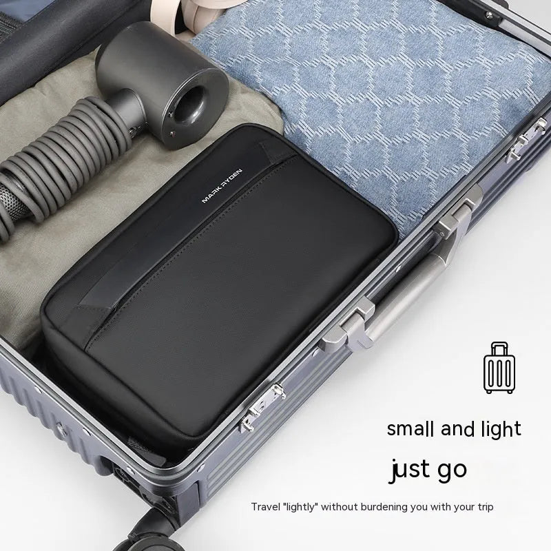 Men's portable Oxford cloth toiletries bag with wet dry separation compartments in graphite gray.