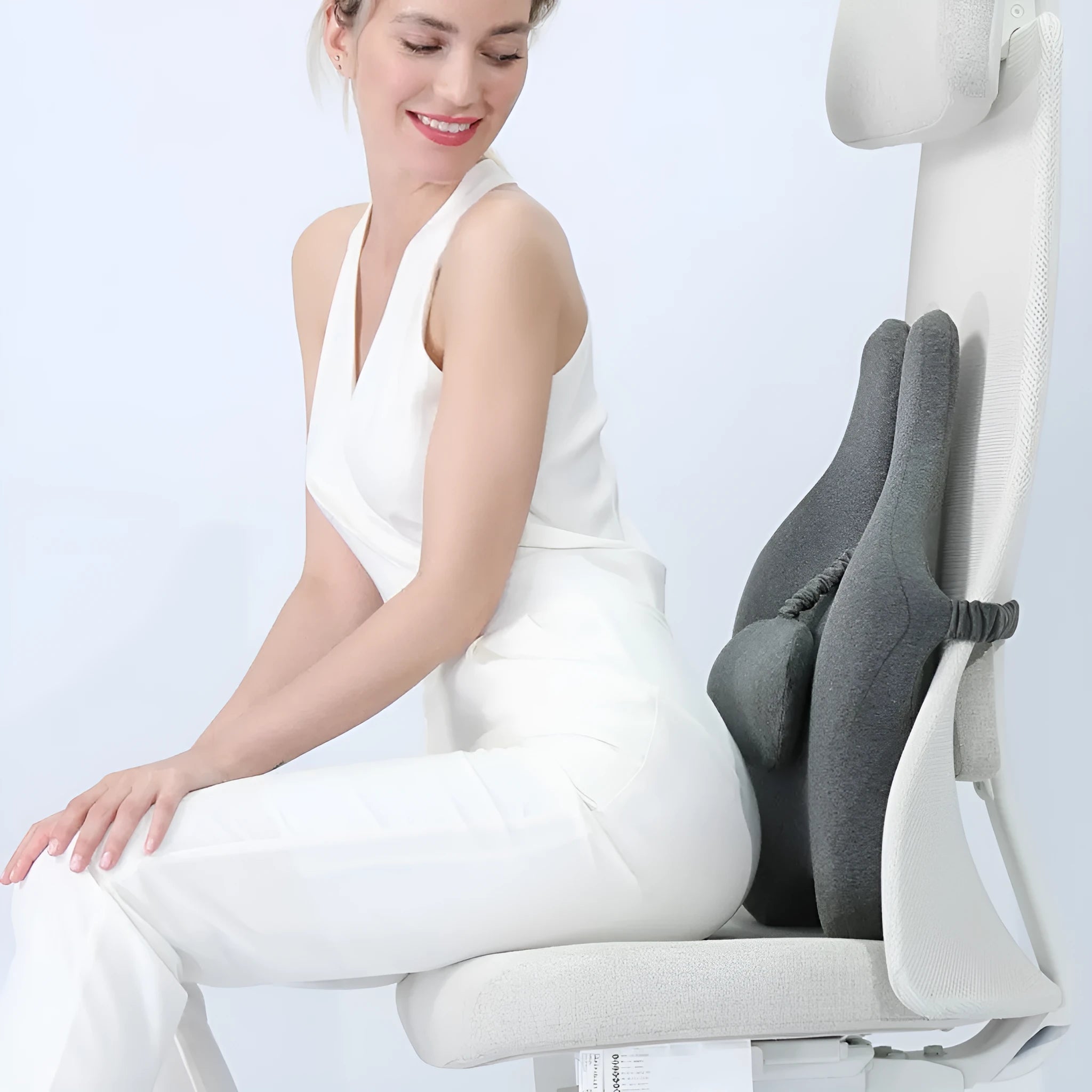 Memory foam car cushion for lumbar support in black, dimensions 50x47x9cm.