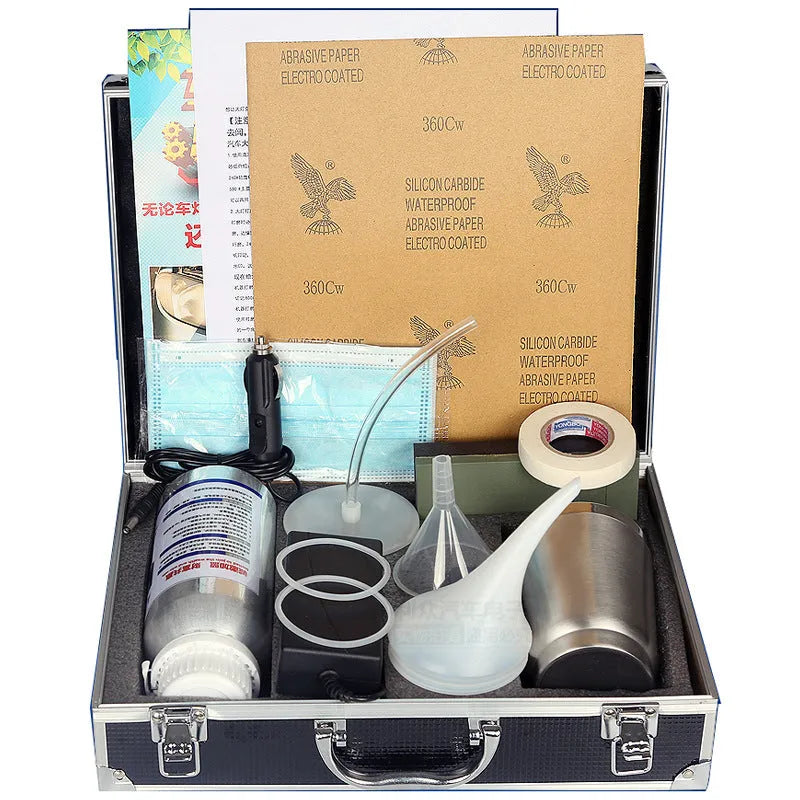 Car headlight repair tool kit in aluminium box with atomisation cup, sandpaper grades and AU or US plug option.