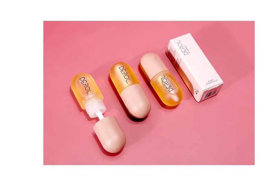 Clear lip plumper oil 5.5ml in light yellow formula with applicator wand for chapped dry lip care