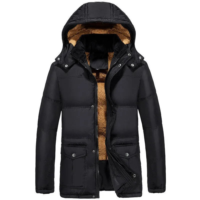 Man wearing a black velvet padded jacket with a hood and double-breasted button front