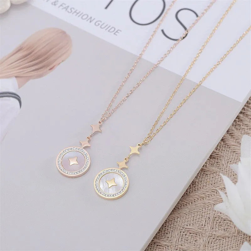 Gold hexagonal star pendant on a titanium steel chain necklace for women with an extender.