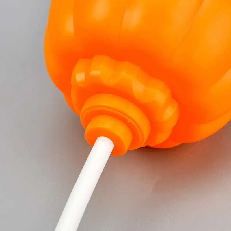 Plastic pumpkin lamp with USB cable, showing yellow and purple light options, scale shown against 8.3x22cm dimensions
