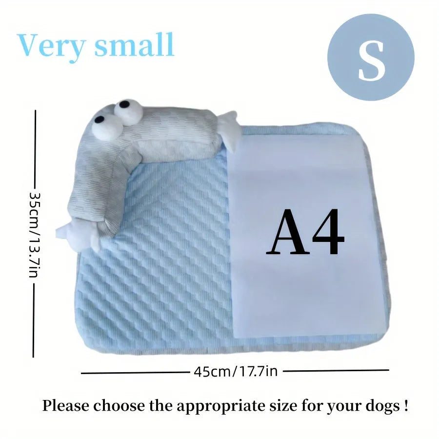 Blue big-eyed monster design pet bed cushion for dogs on a wooden floor.
