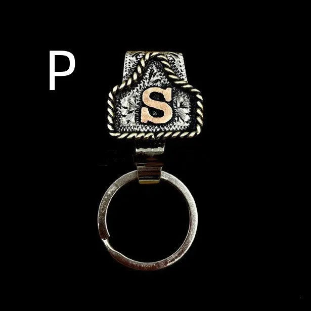Handmade metal cow tag belt keychain in rustic design with multiple colour options