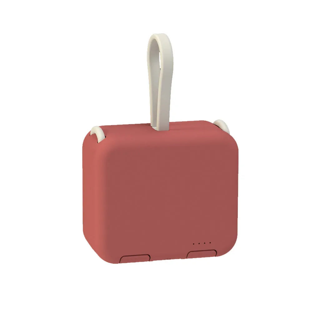 Handbag back clip power bank with flip-out phone stand, shown in blue, green, red, and white colour options.