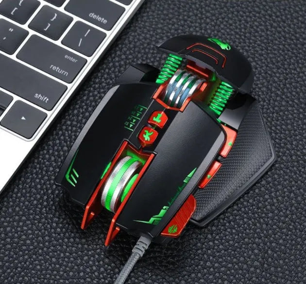 Thunder Wolf V9 black wired gaming mouse with six buttons and ergonomic right-handed shape on a desk