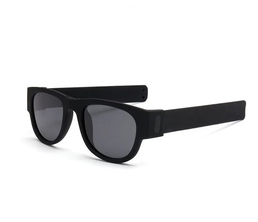 Folding bracelet sunglasses with polarized UV400 resin lens on wrist, black colour