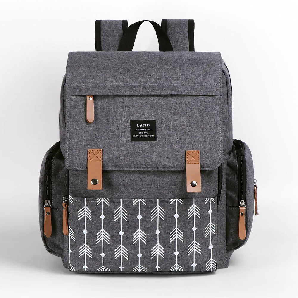 LAND Mommy large capacity oxford cloth diaper backpack with changing mat in beige colour.