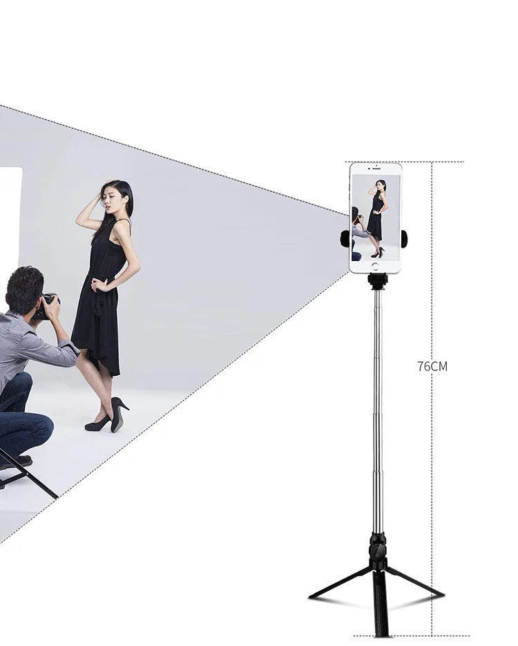 Bluetooth selfie stick tripod with aluminium pole extended, showing phone clip rotation and foldable legs