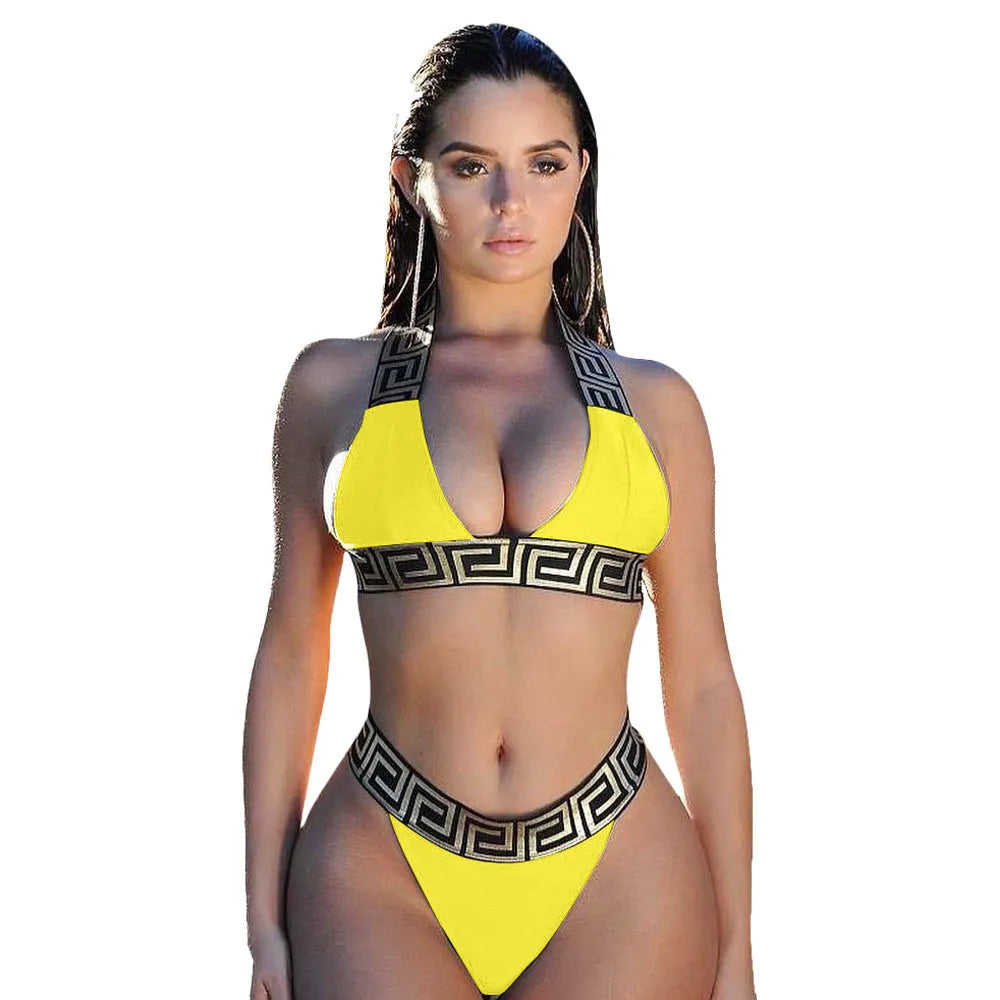 Printed bikini two piece set in polyester, available in yellow, red, black, green, and blue. Wire-free, unpadded design for swimming and wading. Sizes S-XL.