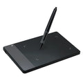 HUION 420 black electronic drawing board with USB cable on desk