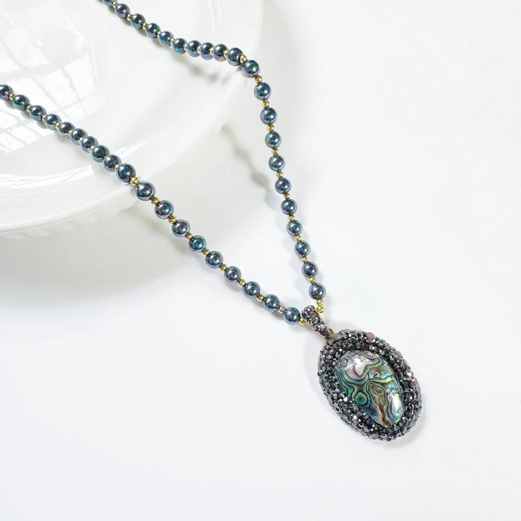 Abalone shell pendant necklace with black stone, beaded chain, geometric oval pendant, vintage retro colour, 60cm.
