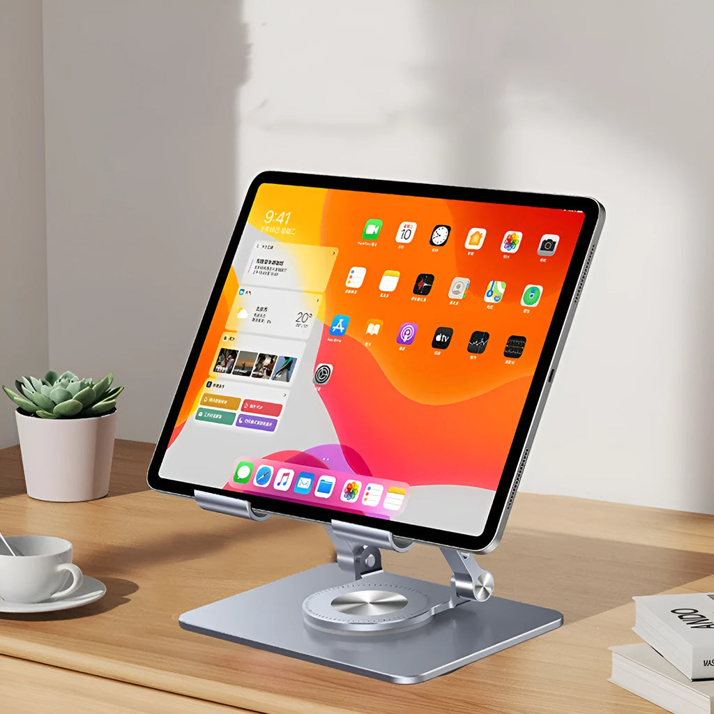 Folding tablet stand with 360-degree rotation in transparent plastic showing portrait orientation