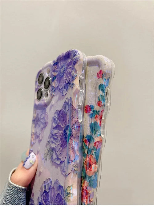 Advanced Art Oil Painting Flower Phone Case with twisted edge and blue light effect, compatible with iPhone models