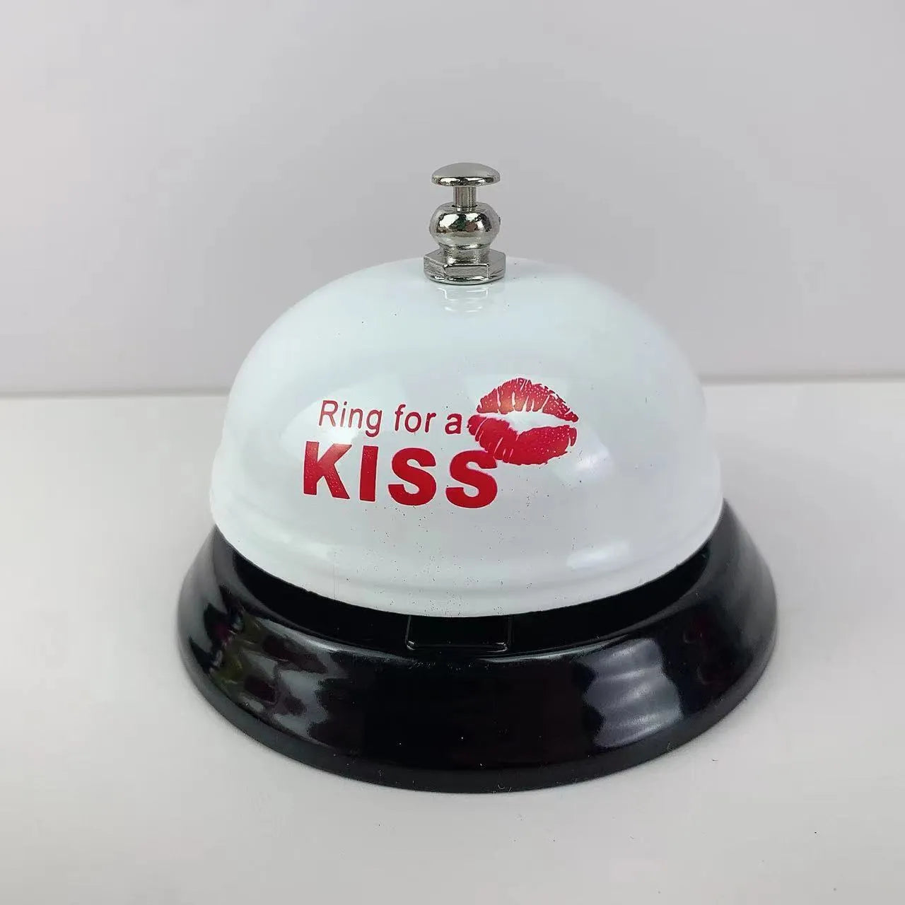 Iron game bell shown in one of ten available colours: blue, green, pink, red, yellow, green tea, or rose kiss.