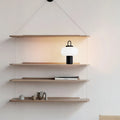 Minimalist Nordic children's bedside table lamp with a warm light glass shade.