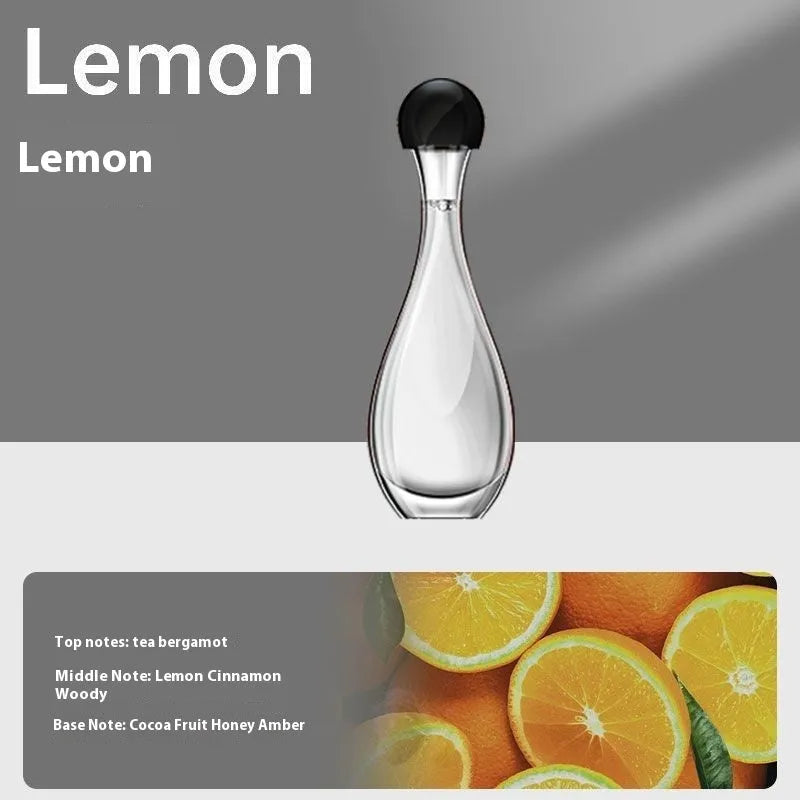 White ultrasonic aroma diffuser with control buttons and mist output, shown with essential oil bottle