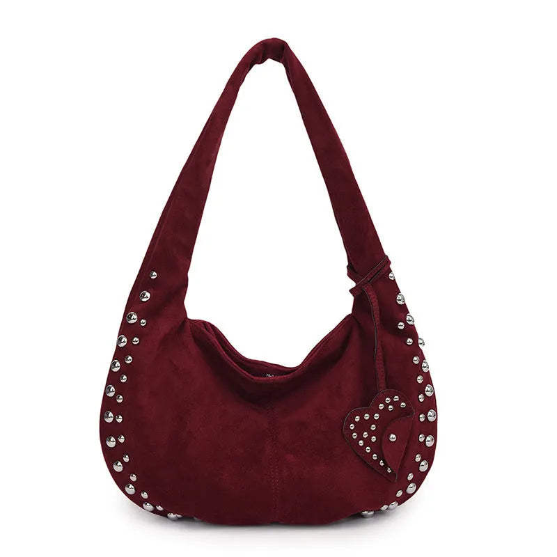 Soft plush women's retro tote handbag in strapless design showing colour options.