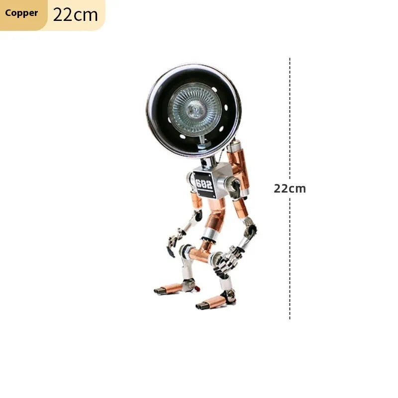 Creative silver or copper robot-shaped decorative desk lamp in 22cm or 29cm size.
