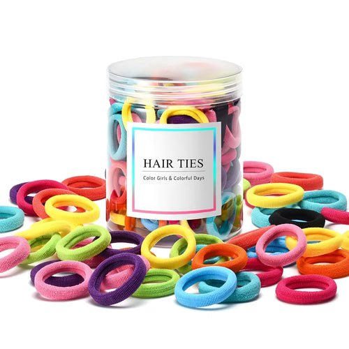 Multicoloured assortment of 100 soft cotton baby hair ties in a small jar, showing seamless design.