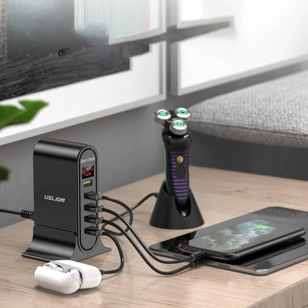 Black and white smart USB charger with LED digital display, showing EU, UK, and US plug variants.