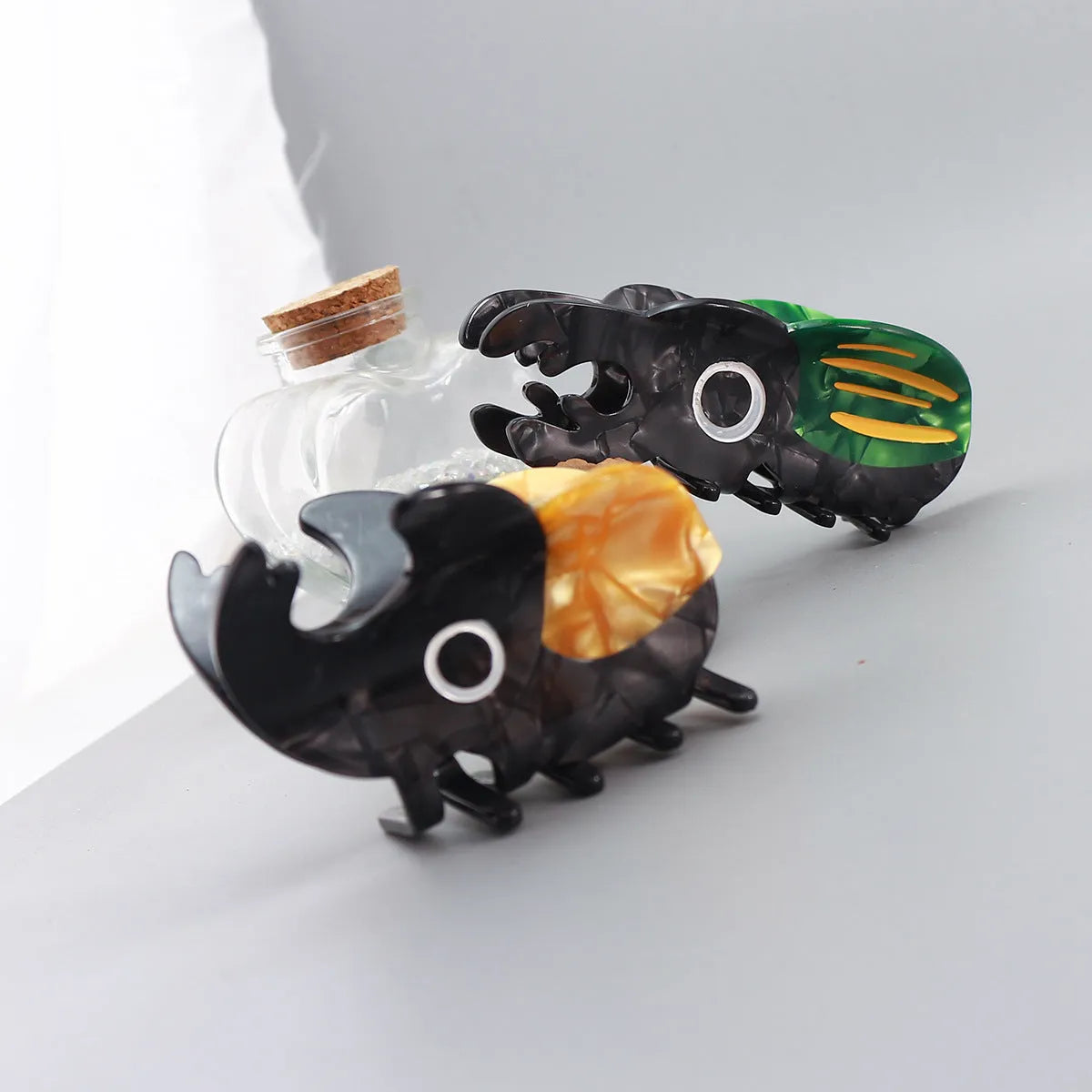 Handmade cellulose acetate beetle hair clip with cartoon insect design in green, orange, or white