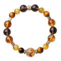 Lucky Jinba natural yellow tiger-eye crystal bracelet with geometric beads, shown in 10MM and 12MM size options.
