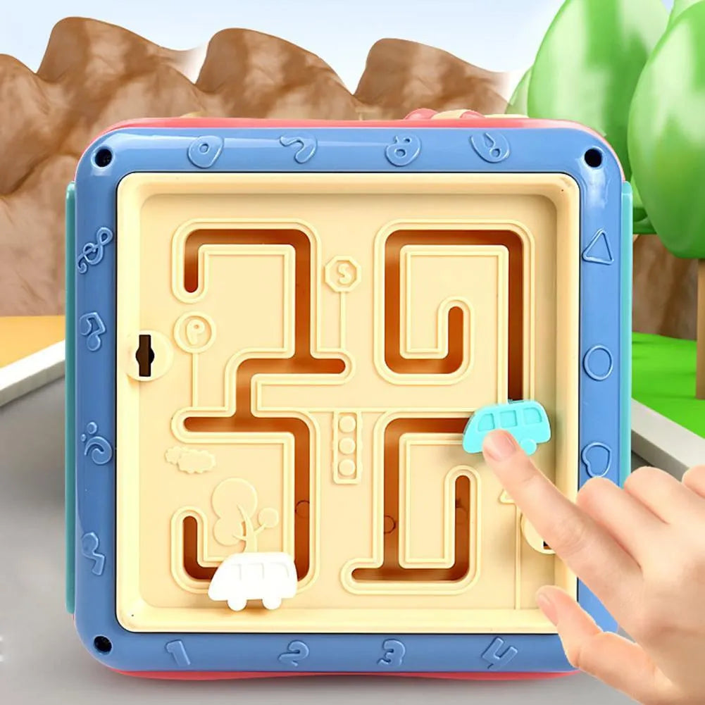 Colourful six-sided baby activity cube with bead maze, clock, and car game panels.